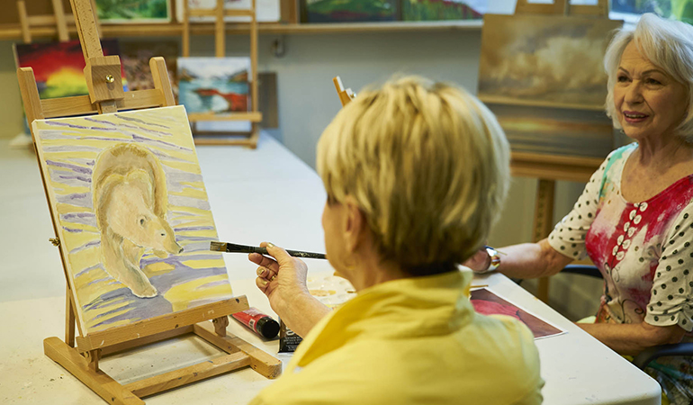 Residents in a painting class