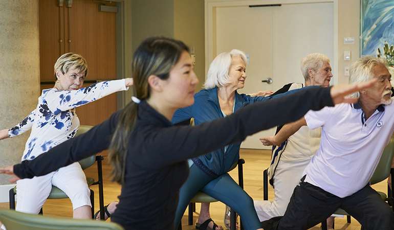 Westerleigh PARC resident Bette in yoga class