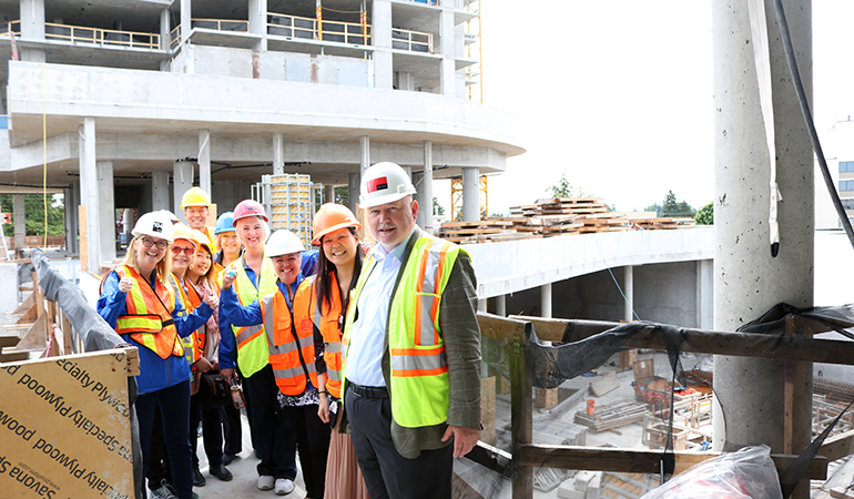 Rainer taking the sales team on a tour of Oceana PARC's construction site