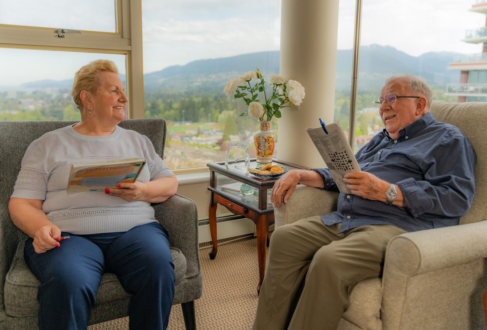Summerhill PARC residents Marlene and Harry chatting in their suite