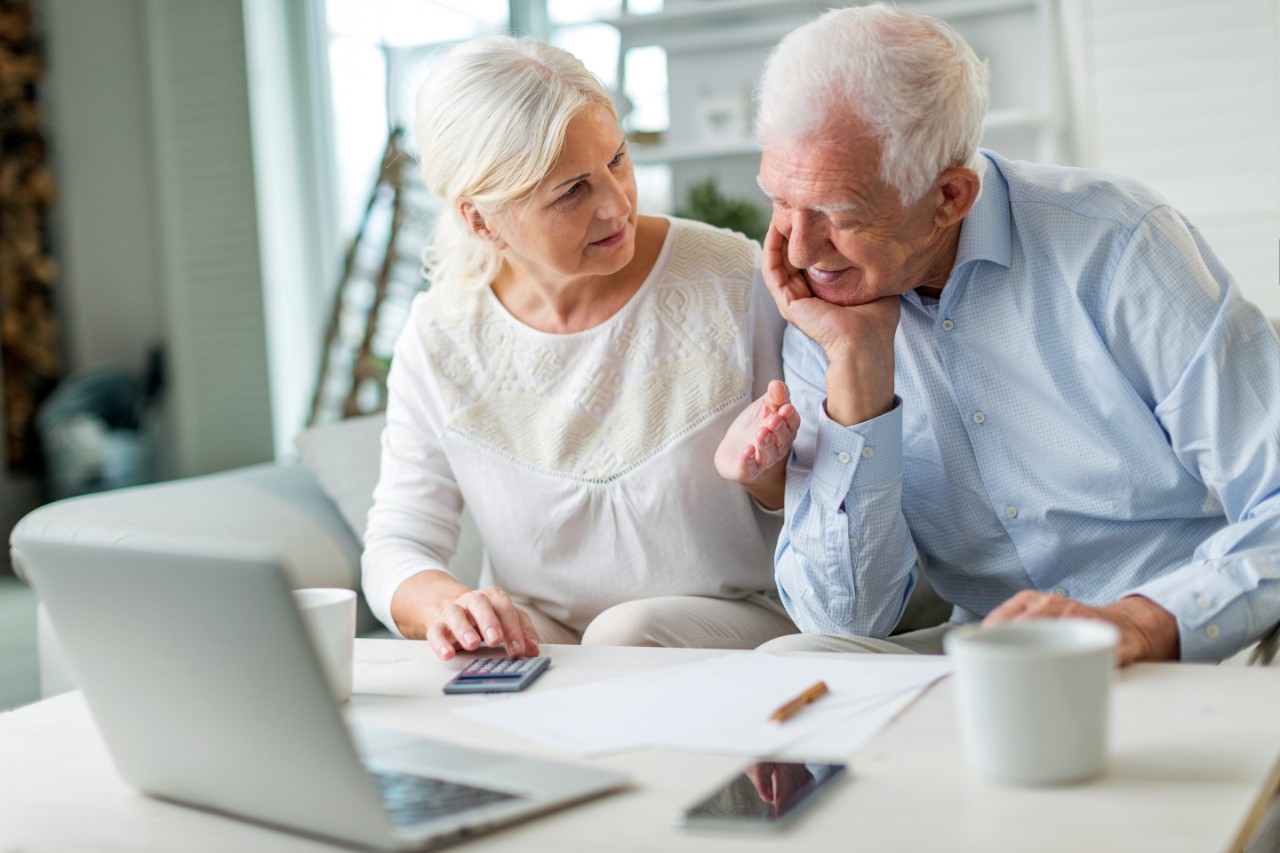 Senior couple discussing finances