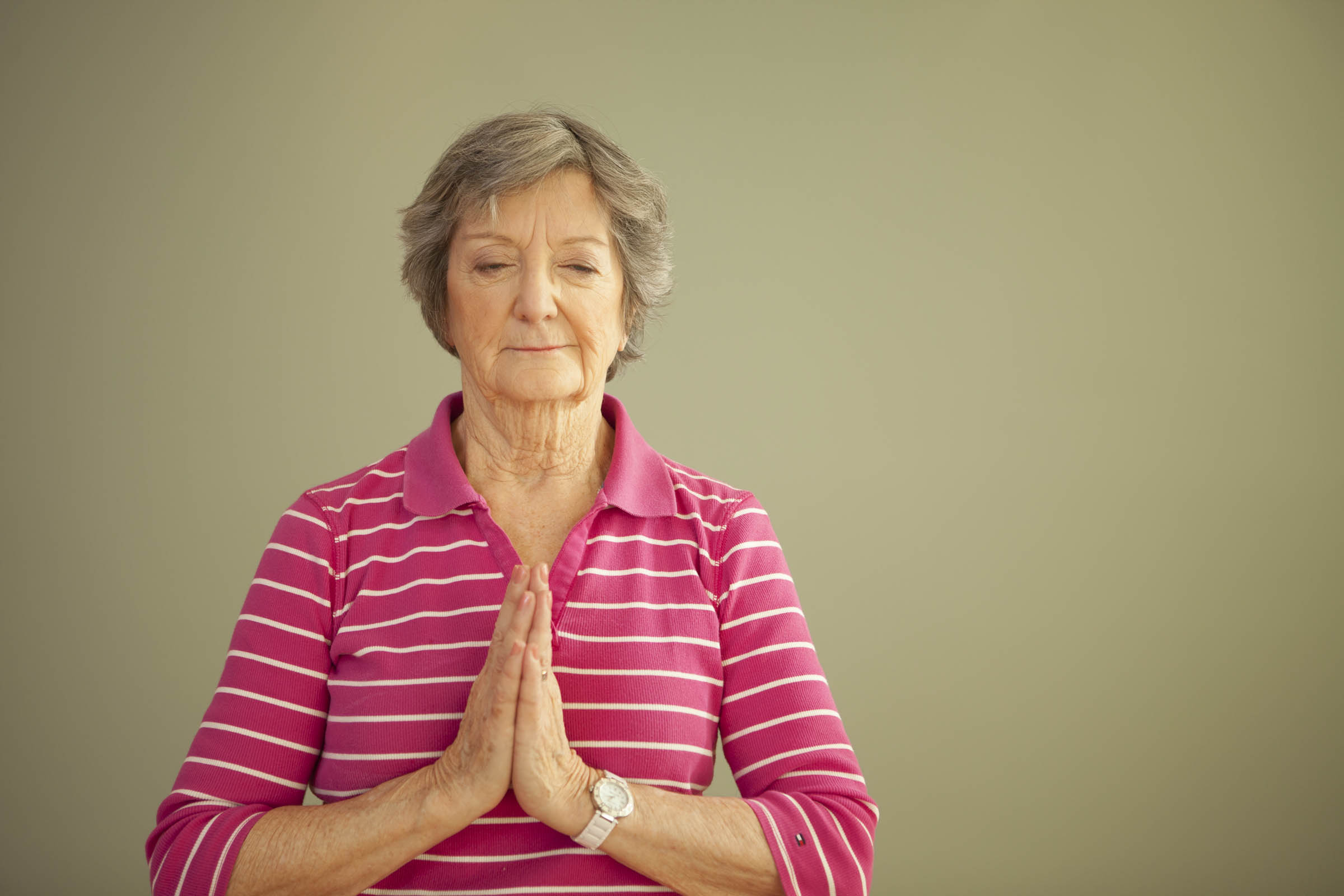 Senior woman meditating