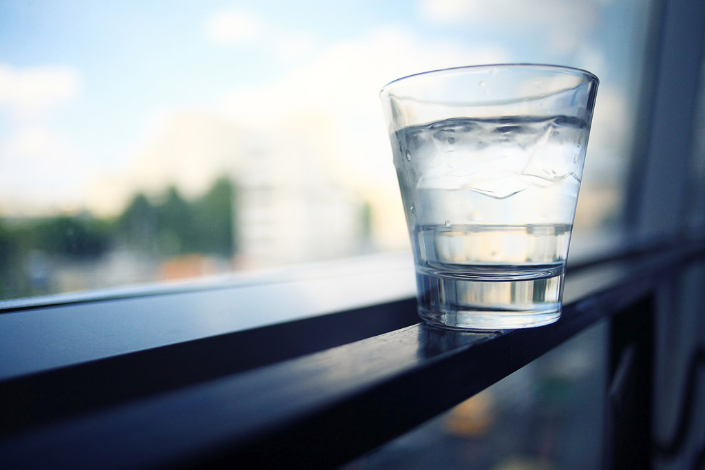 glass of water on a ledge